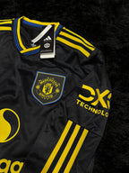 MANCHESTER UNITED LONGSLEEVE 25/26 UCL VERSION