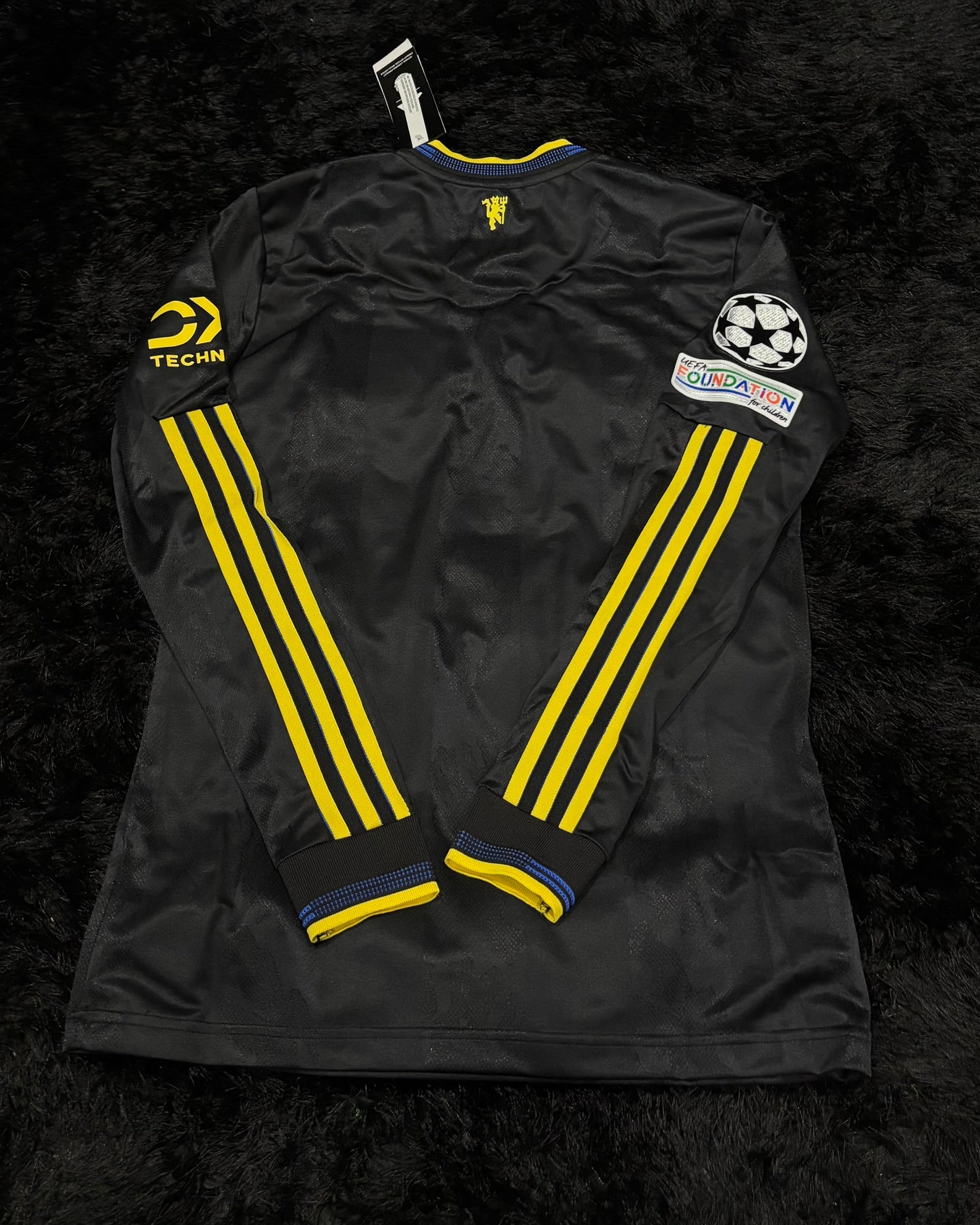 MANCHESTER UNITED LONGSLEEVE 25/26 UCL VERSION